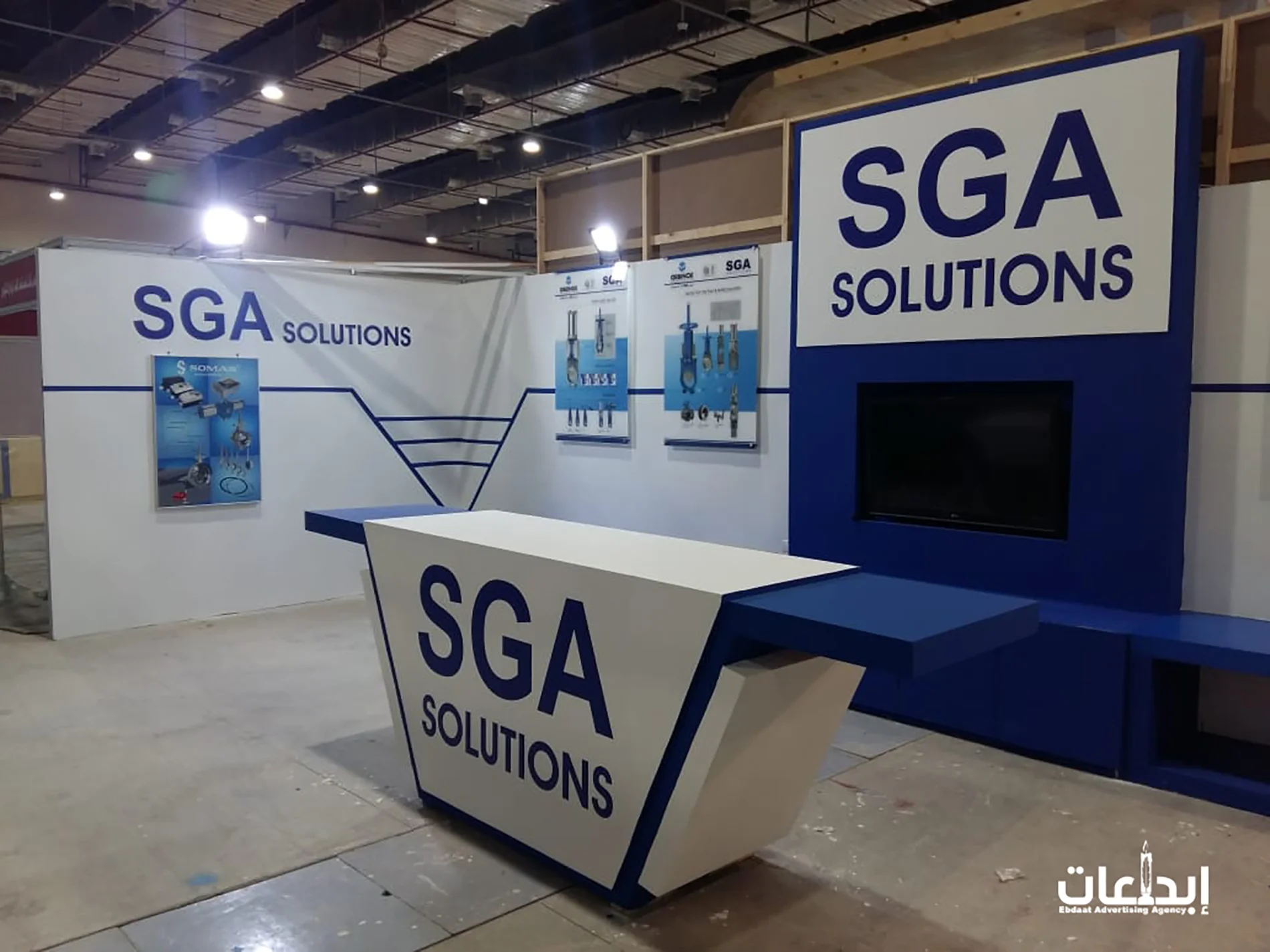 جناح SGA Solutions بعد التنفيذ في أرض المعرض بكاونتر الاستقبال